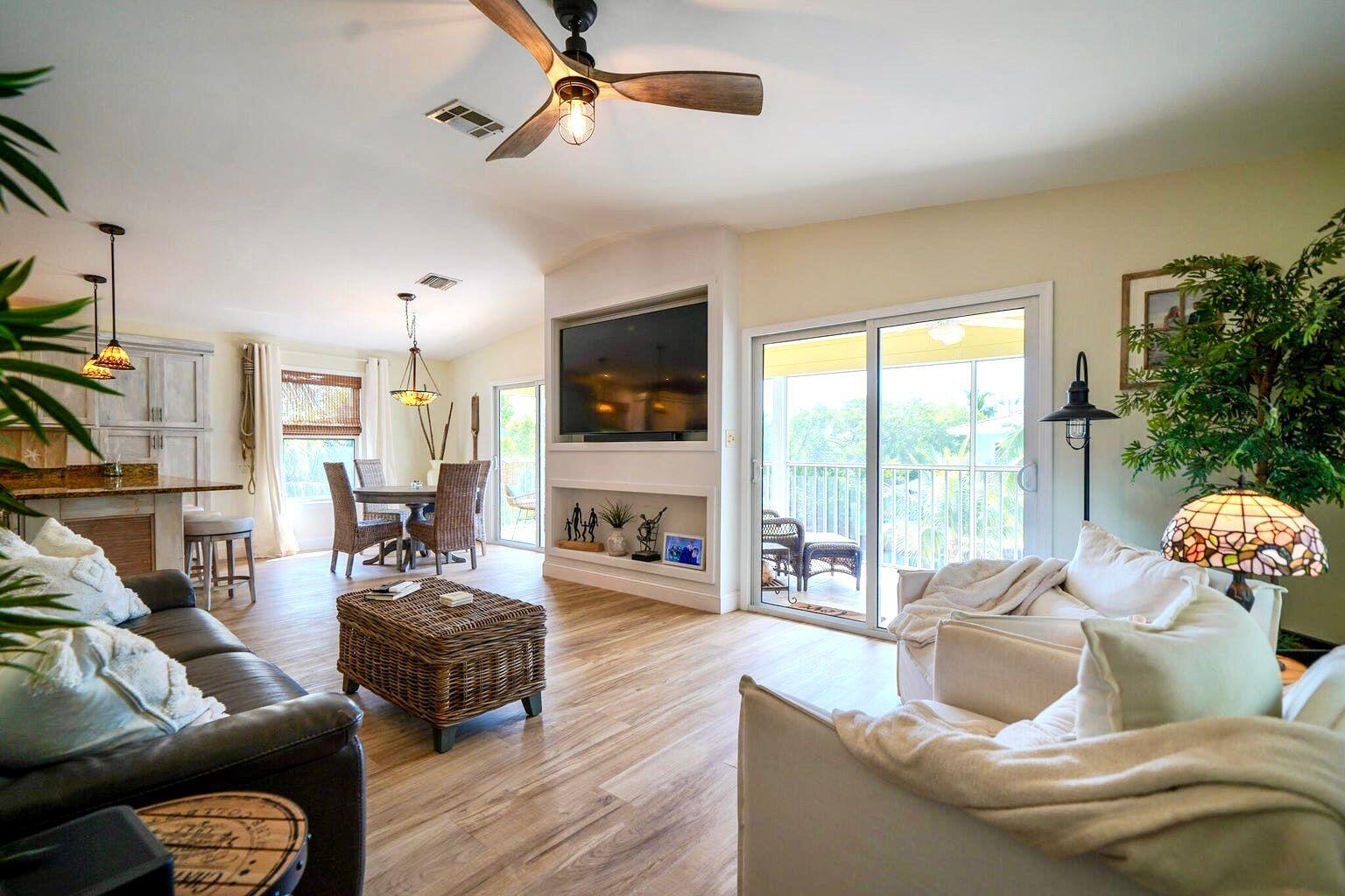 21 Corrine Place Key Largo, FL 33037 - Photo 46 of 46 a living room with furniture and a floor to ceiling window