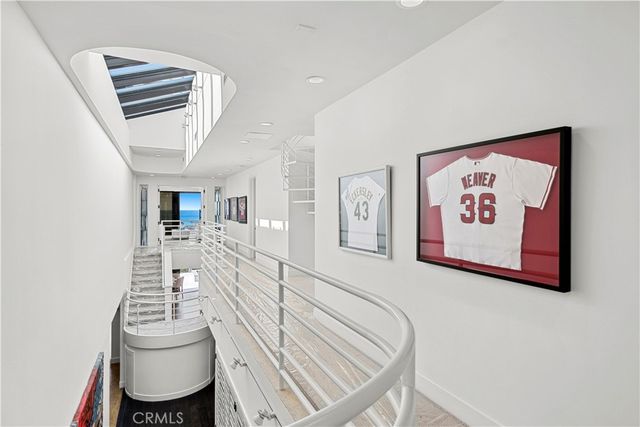 a view of swimming pool with outdoor seating and city view