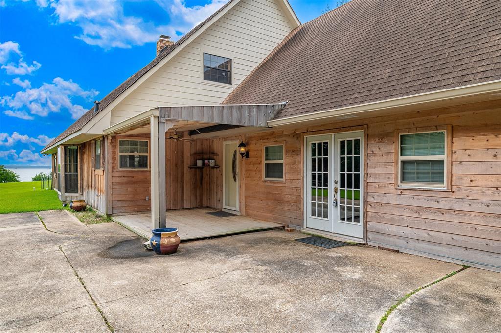 10307 Pirogue Road Oil City, LA 71061 - Photo 27 of 36 a view of a house with small yard