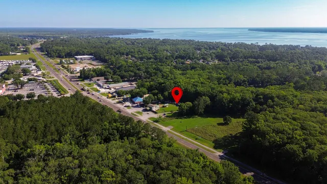 an aerial view of a town with couple of houses