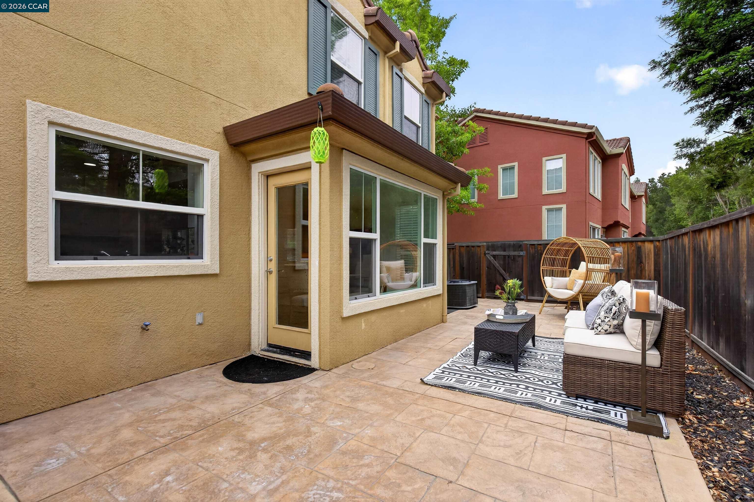 124 Coralflower Lane San Ramon, CA 94582 - Photo 28 of 47 a view of a patio with couches and potted plants