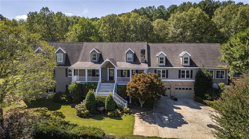 1380 Double Springs Road Monroe, GA 30656 - Photo 1 of 1 an aerial view of a house with a yard