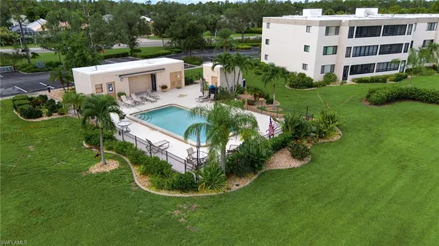 an aerial view of a house with a garden