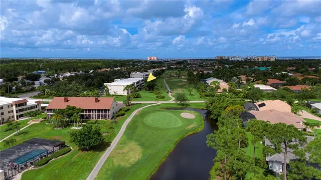 a front view of a house with a garden and plants