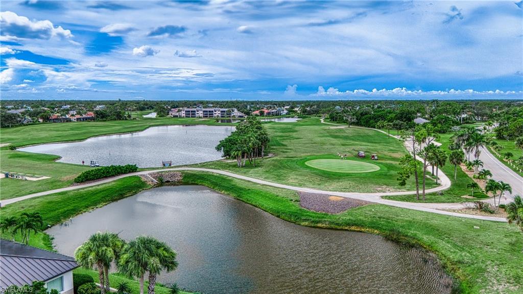 801 Islamorada Boulevard, Unit 22B Punta Gorda, FL 33955 - Photo 42 of 48 an aerial view of a golf course with a lake view