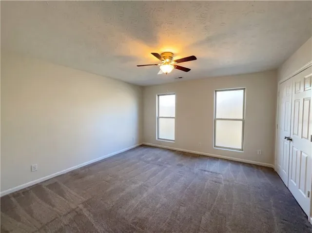 a bathroom with a sink a toilet and bathtub