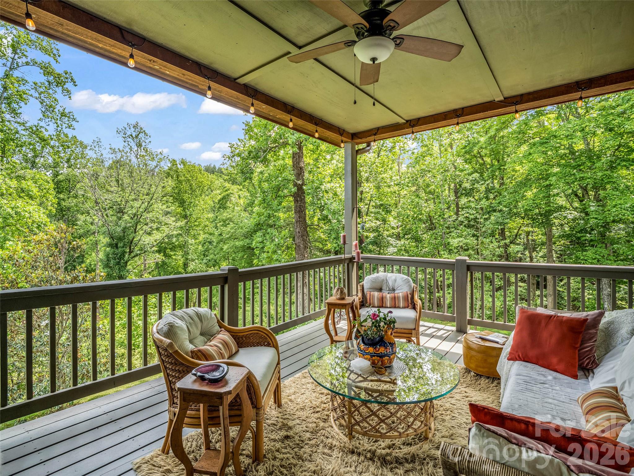 120 Glenn Court Mill Spring, NC 28756 - Photo 19 of 48 a view of a balcony with furniture