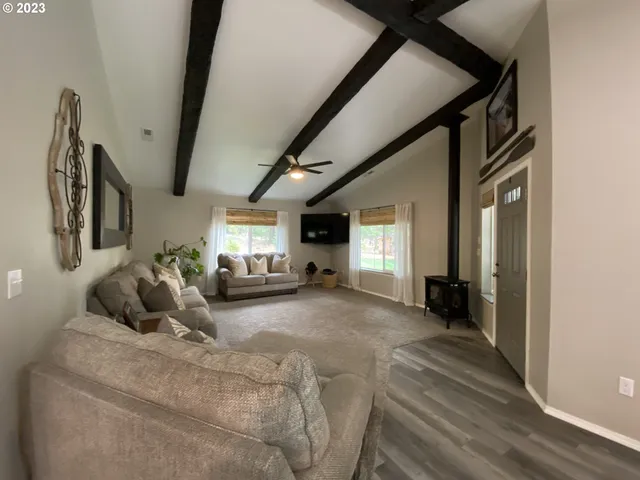 a bed room with a bed and a tv