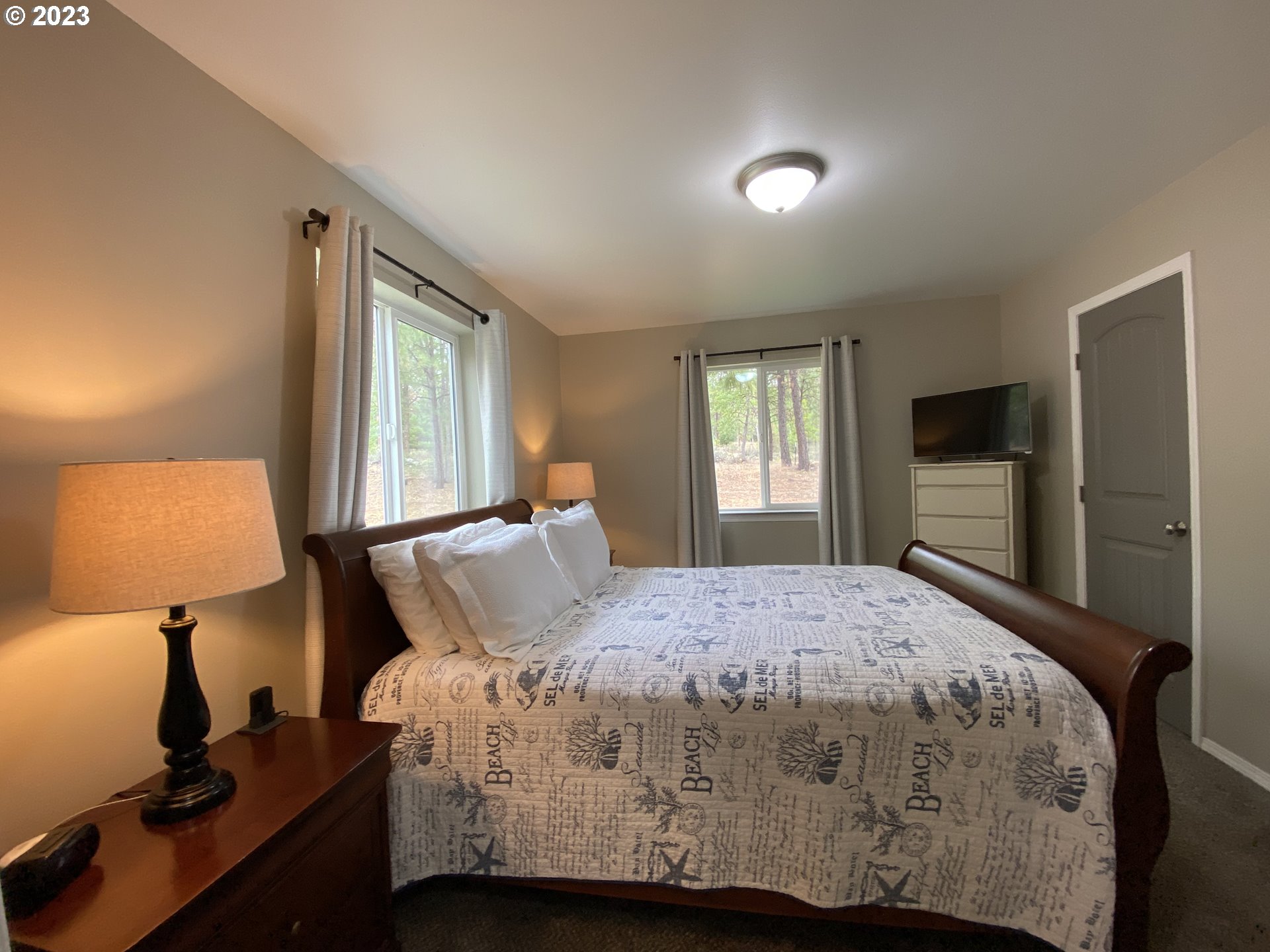 227 Locust Lane Goldendale, WA 98620 - Photo 26 of 48 a bedroom with a bed and a window