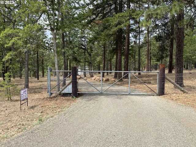 a view of a balcony with chairs