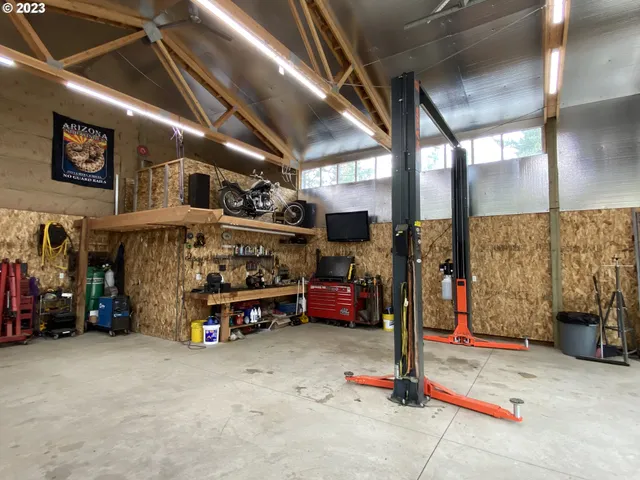 a view of a tree in front of a house