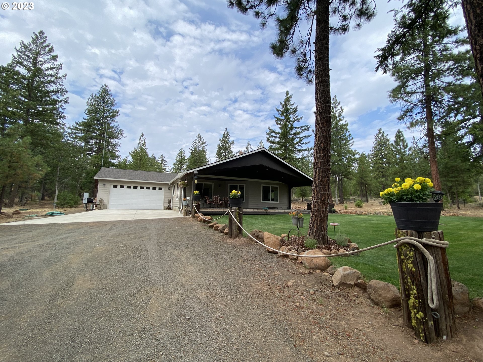 227 Locust Lane Goldendale, WA 98620 - Photo 48 of 48 a view of a house with backyard and sitting area