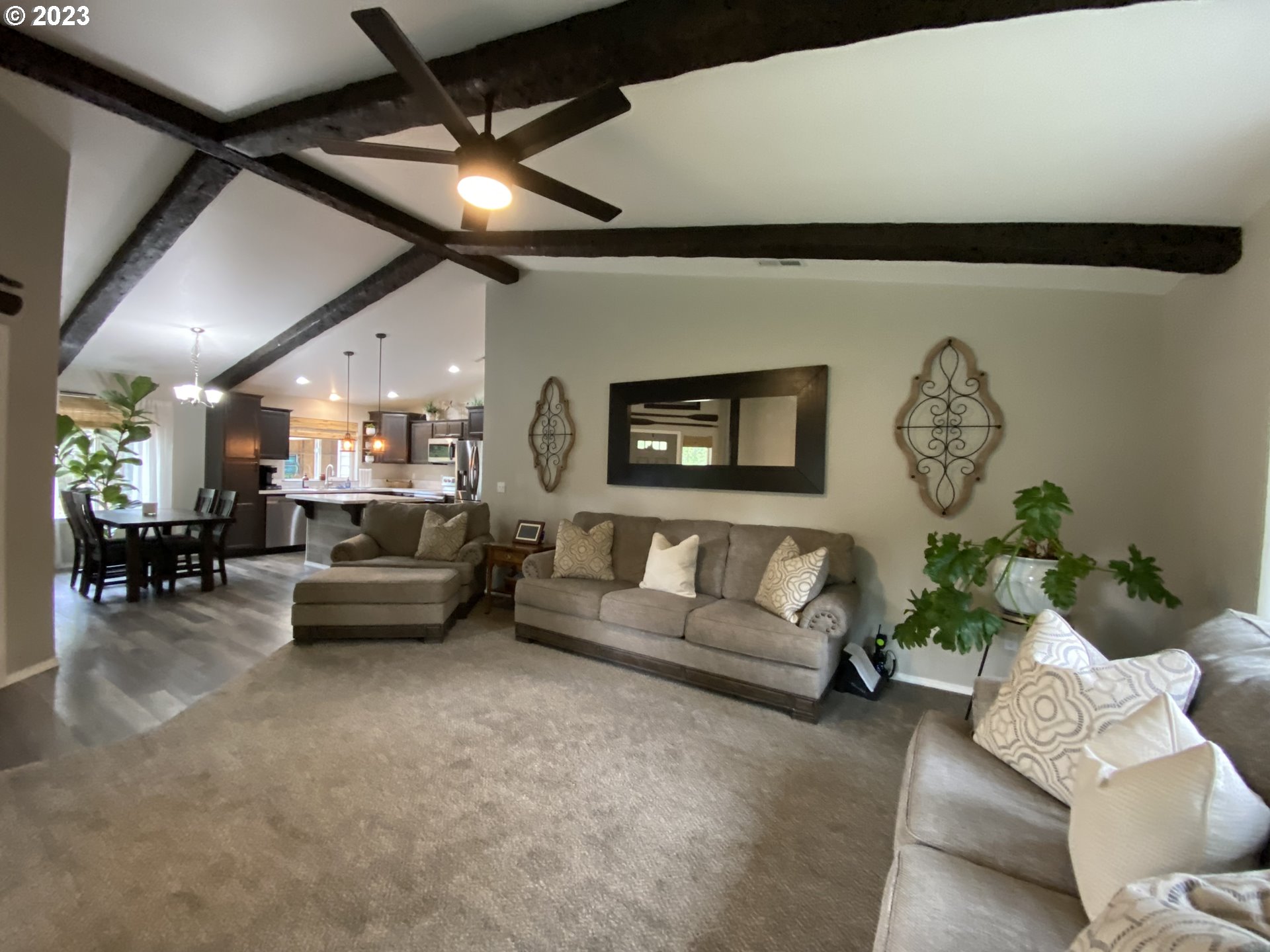 227 Locust Lane Goldendale, WA 98620 - Photo 9 of 48 a living room with furniture a chandelier