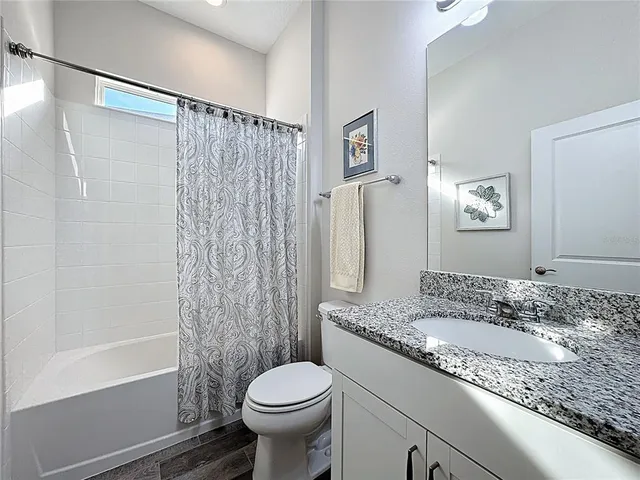 a workspace with a computer on the desk and chair