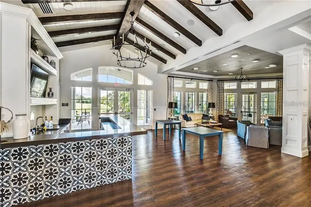 a view of a swimming pool with a lounge chair
