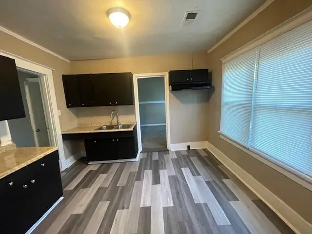 a view of a living room with flat screen tv