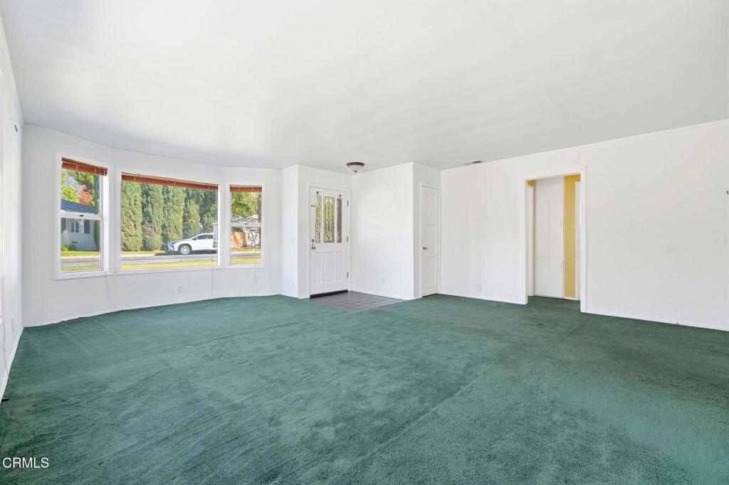 672 West Mendocino Street Altadena, CA 91001 - Photo 4 of 33 a view of an empty room with windows