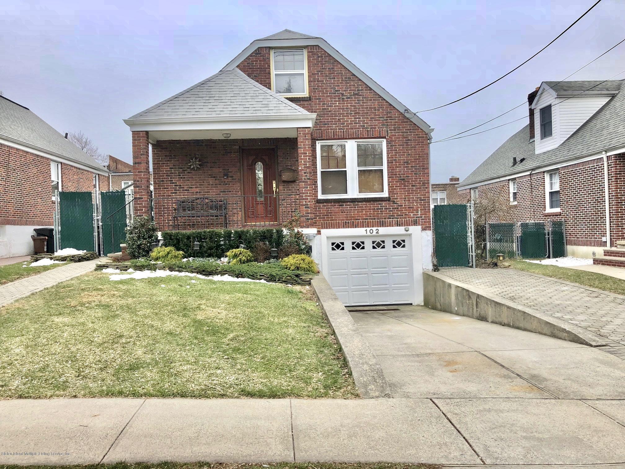 102 Governor Road Staten Island, NY 10314 - Photo 1 of 6 a view of a house with a yard
