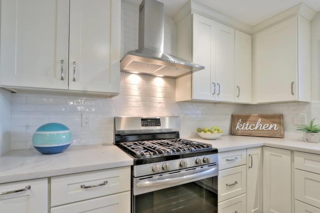 3959 Paladin Drive San Jose, CA 95124 - Photo 11 of 31 a kitchen with white cabinets and appliances