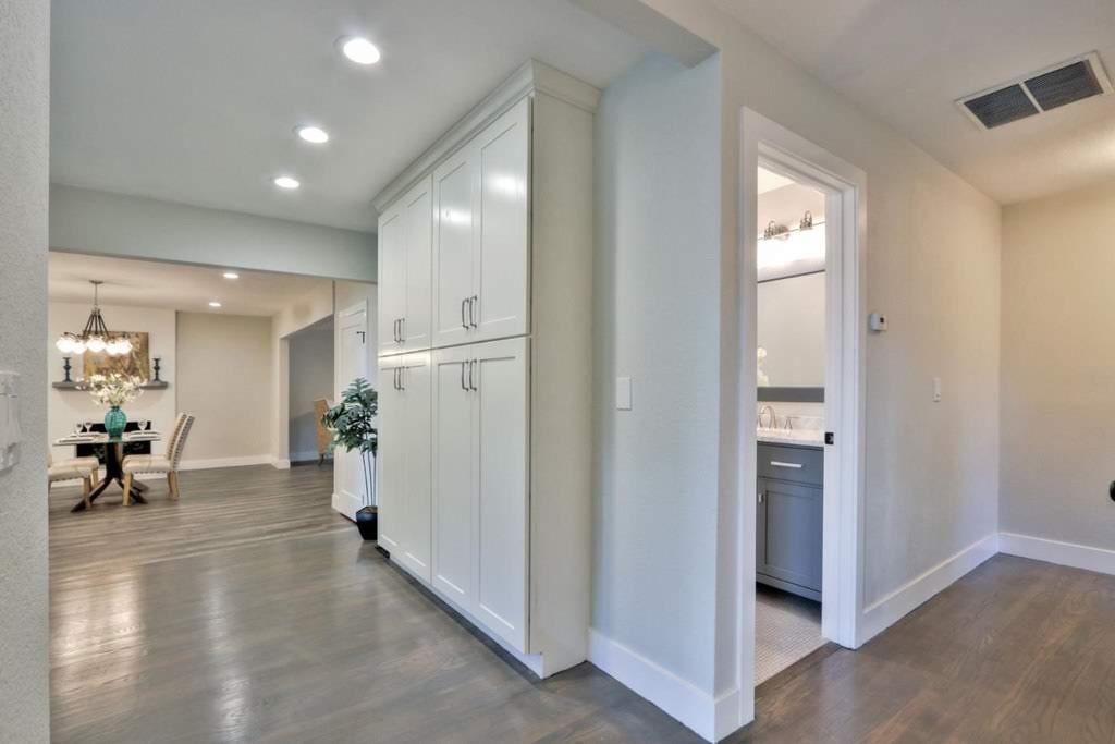 3959 Paladin Drive San Jose, CA 95124 - Photo 12 of 31 a view of a hallway with dining area a livingroom and chandelier