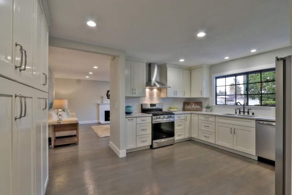 3959 Paladin Drive San Jose, CA 95124 - Photo 9 of 31 a large kitchen with stainless steel appliances lots of white cabinets