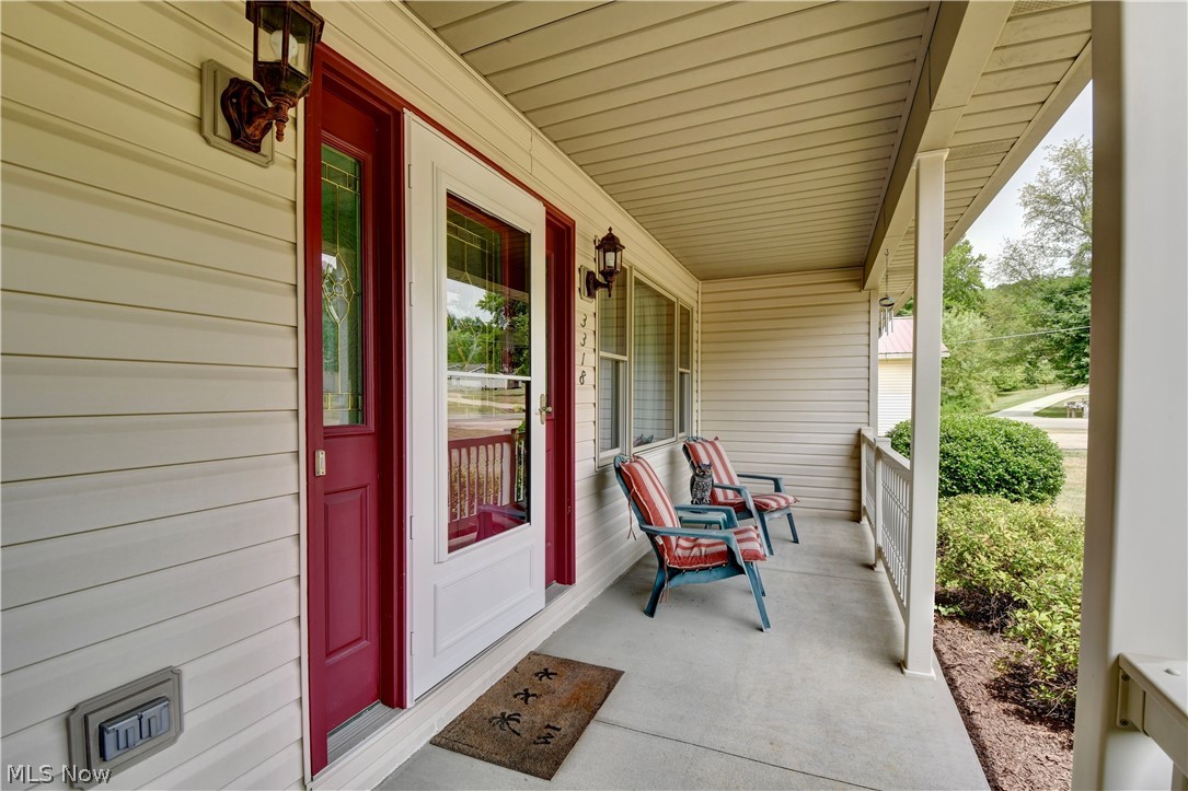 3318 Simpson Road Southeast Dennison, OH 44621 - Photo 5 of 31 View of patio with covered porch