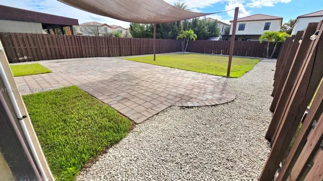 a view of a balcony with furniture