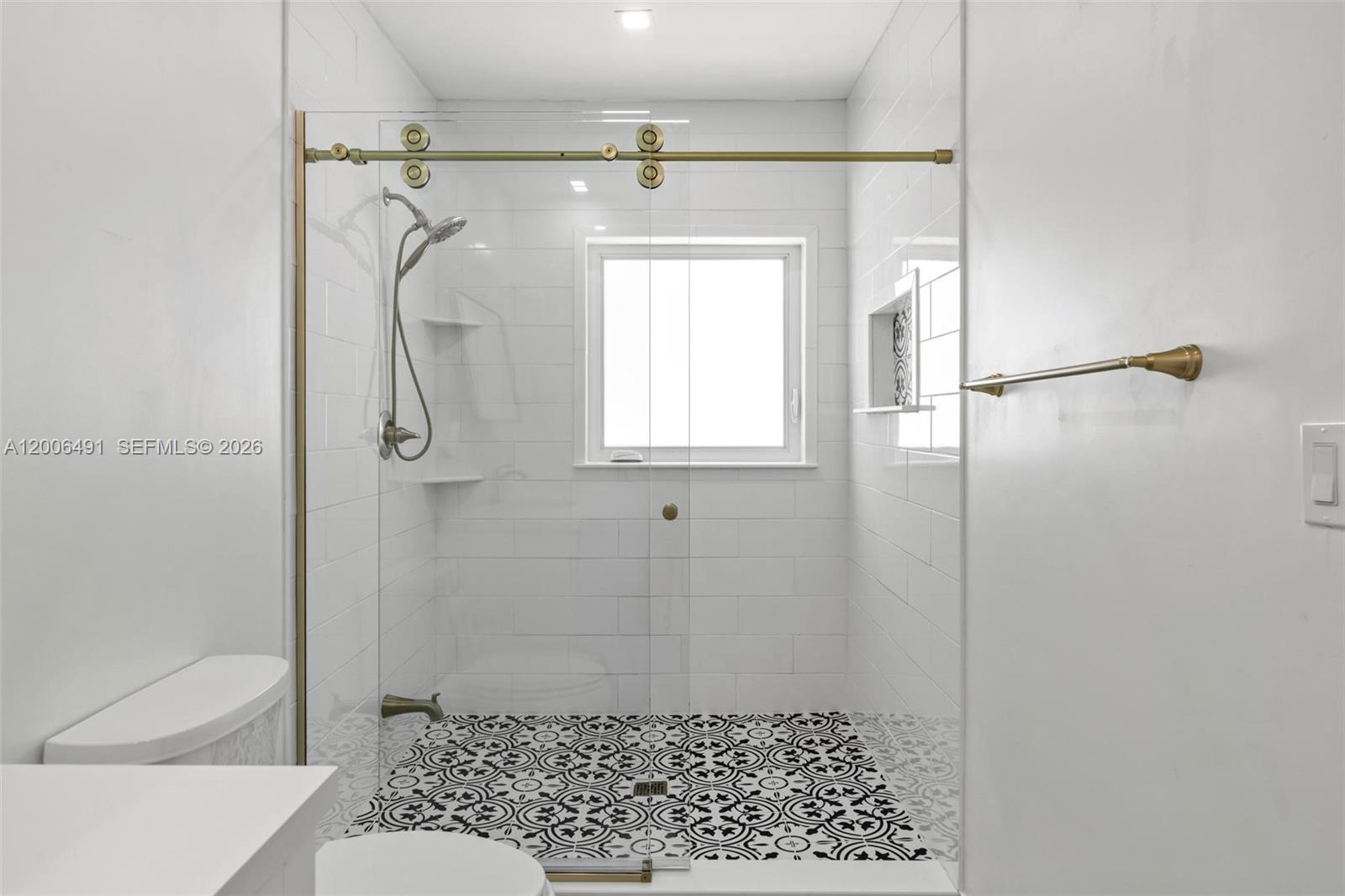 22275 Southwest 256th Street Homestead, FL 33031 - Photo 19 of 57 a bathroom with a shower