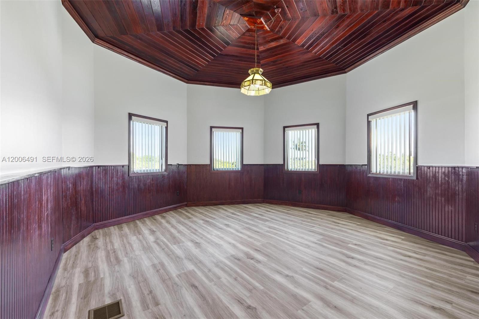 22275 Southwest 256th Street Homestead, FL 33031 - Photo 21 of 57 a view of entryway with wooden floor