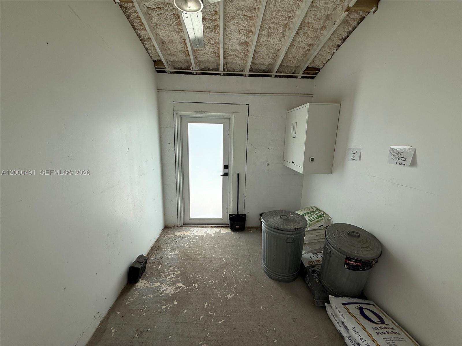 22275 Southwest 256th Street Homestead, FL 33031 - Photo 51 of 57 a view of a hallway with entryway
