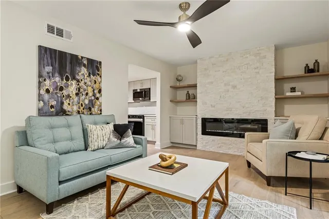 a view of a hallway with windows