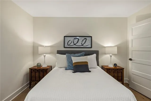 a bedroom with a bed and furniture