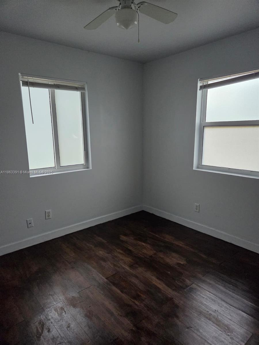 4351 Northeast 18th Avenue Pompano Beach, FL 33064 - Photo 12 of 18 an empty room with a window
