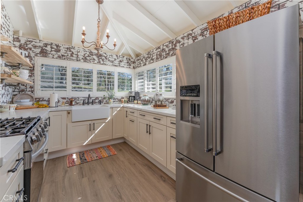 30429 Ridgewood Drive Potter Valley, CA 95469 - Photo 12 of 38 a kitchen with stainless steel appliances a refrigerator and a sink