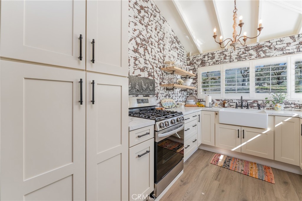 30429 Ridgewood Drive Potter Valley, CA 95469 - Photo 14 of 38 a kitchen with cabinets and stainless steel appliances
