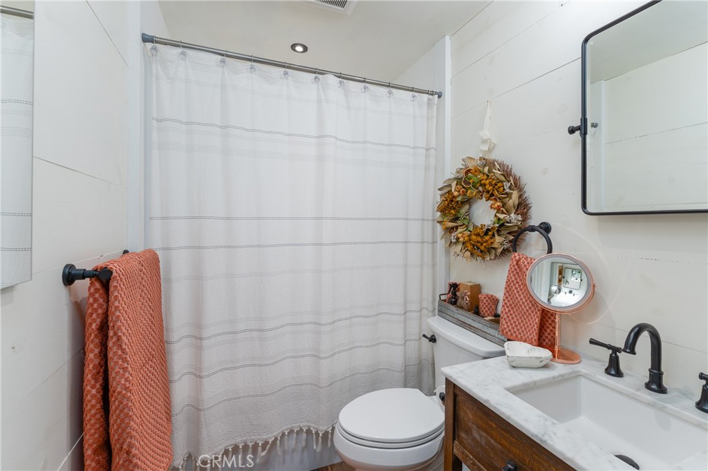 30429 Ridgewood Drive Potter Valley, CA 95469 - Photo 15 of 38 a bathroom with a sink toilet and shower