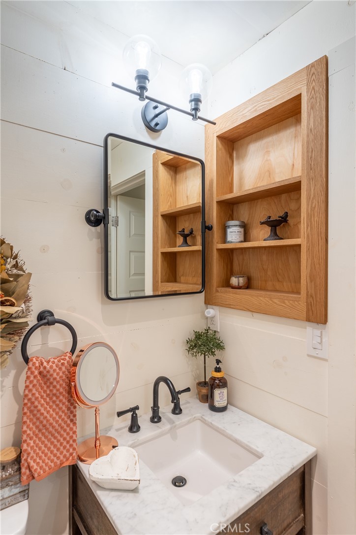 30429 Ridgewood Drive Potter Valley, CA 95469 - Photo 16 of 38 a bathroom with a sink and a mirror