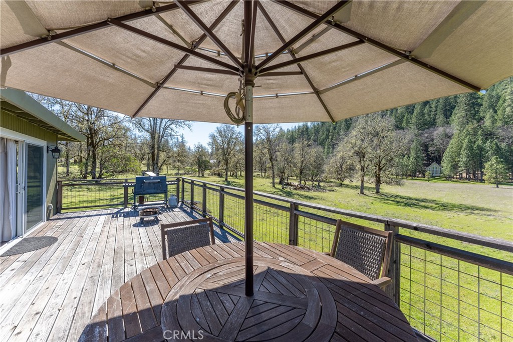 30429 Ridgewood Drive Potter Valley, CA 95469 - Photo 21 of 38 a view of a chairs and table in the balcony