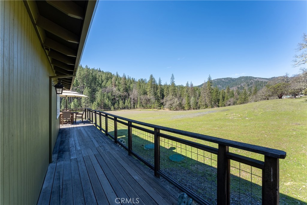 30429 Ridgewood Drive Potter Valley, CA 95469 - Photo 22 of 38 a view of balcony with wooden floor and mountain view