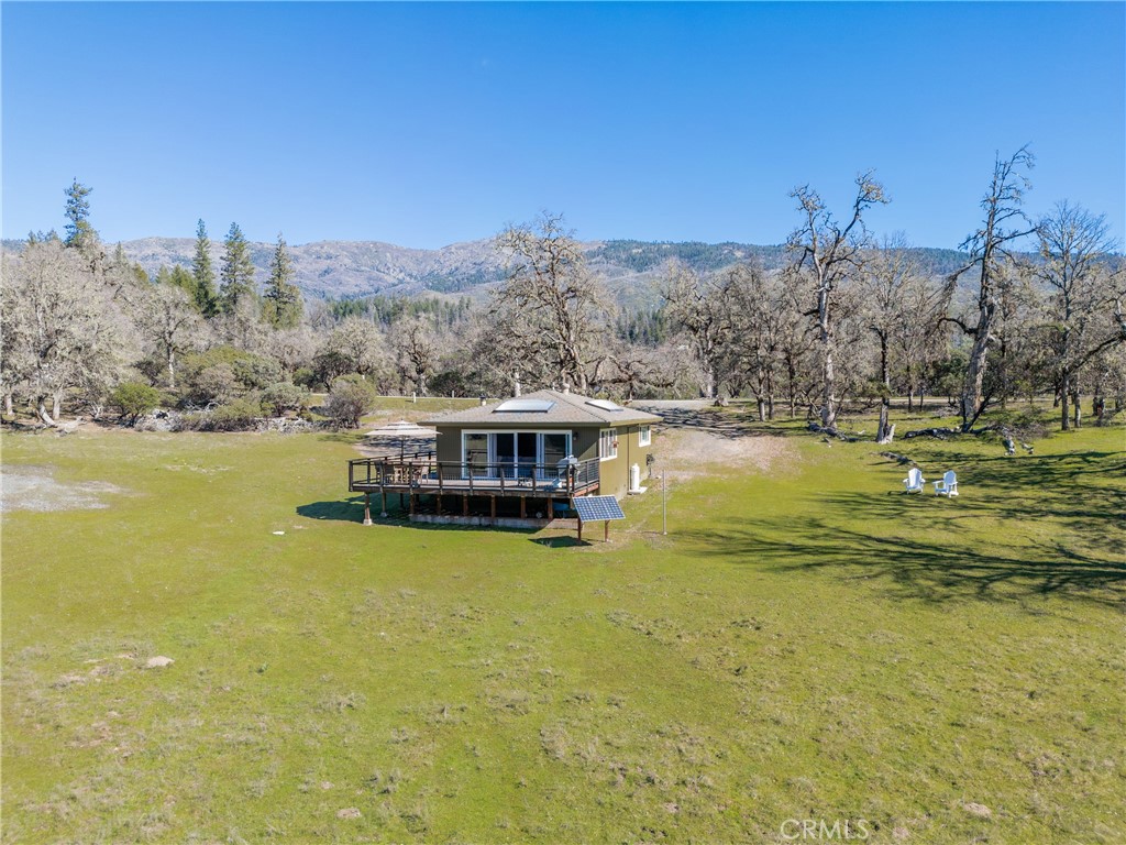 30429 Ridgewood Drive Potter Valley, CA 95469 - Photo 27 of 38 a view of a lake with houses in the back