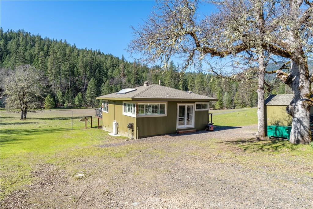 30429 Ridgewood Drive Potter Valley, CA 95469 - Photo 3 of 38 a view of a house with a yard