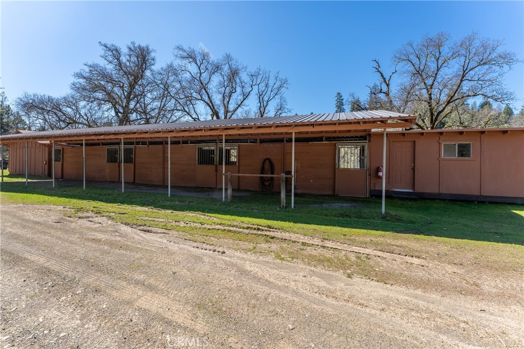 30429 Ridgewood Drive Potter Valley, CA 95469 - Photo 34 of 38 a view of a house with a backyard