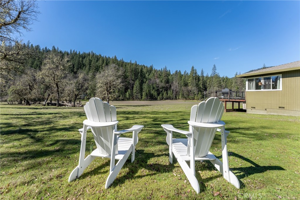30429 Ridgewood Drive Potter Valley, CA 95469 - Photo 37 of 38 a patio with table and chairs and potted plants