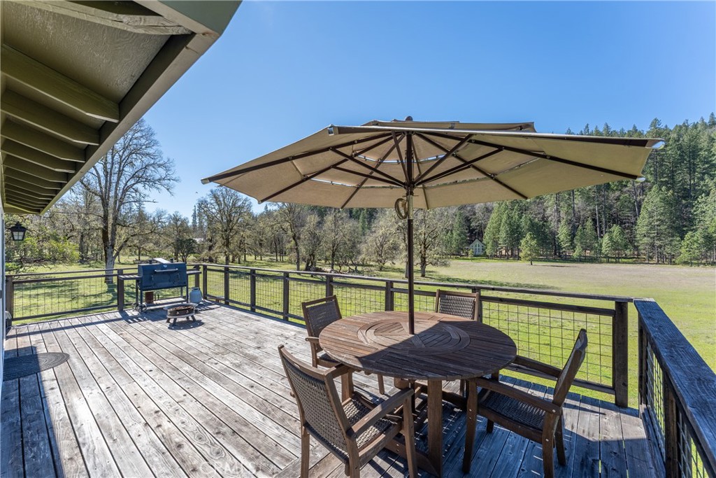 30429 Ridgewood Drive Potter Valley, CA 95469 - Photo 5 of 38 a view of chair and table in the balcony