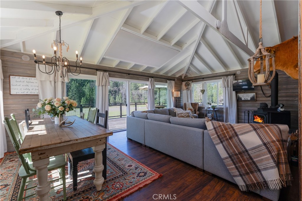 30429 Ridgewood Drive Potter Valley, CA 95469 - Photo 9 of 38 a living room with furniture and a chandelier
