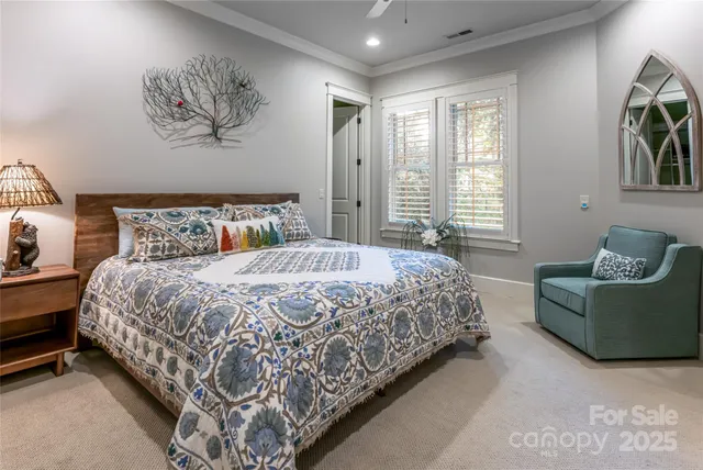 a bathroom with a granite countertop sink a toilet and a mirror