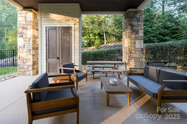 a outdoor living space with furniture and a potted plant