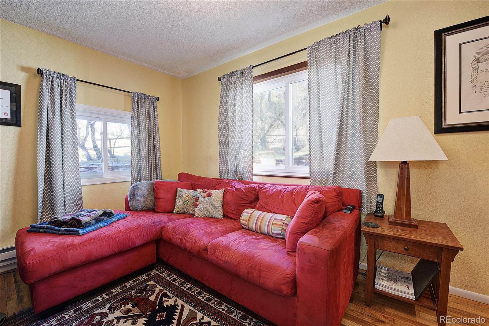 5384 Olde Stage Road Boulder, CO 80302 - Photo 13 of 28 a living room with furniture and a window