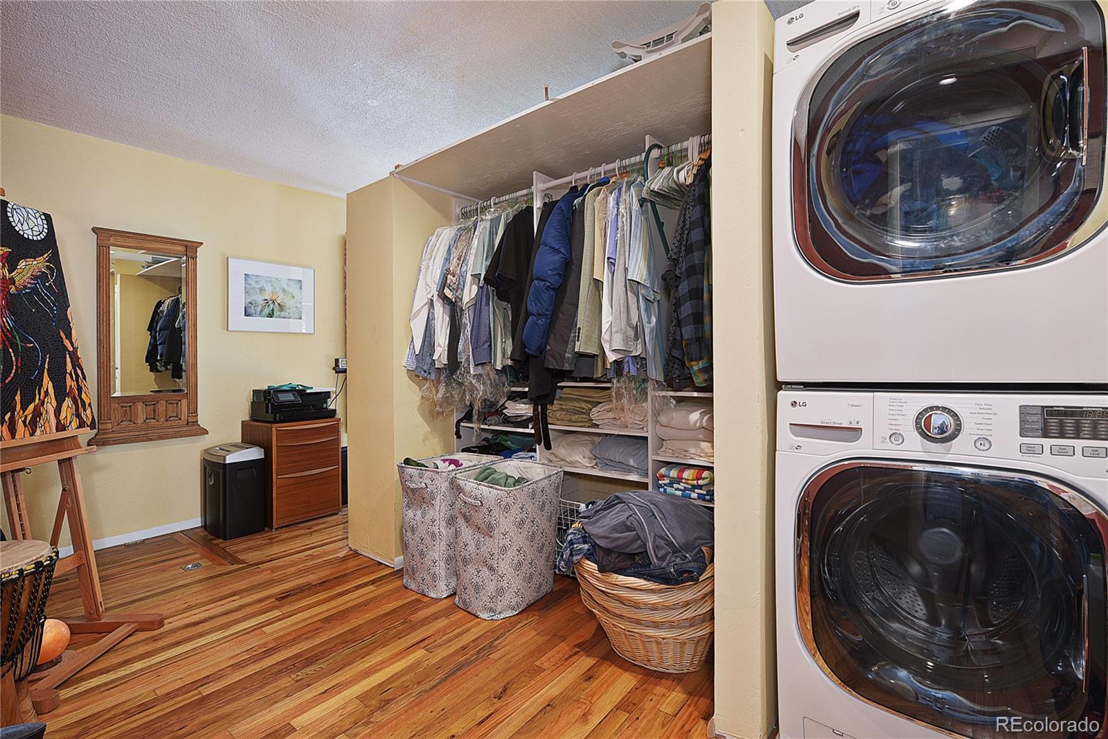 5384 Olde Stage Road Boulder, CO 80302 - Photo 14 of 28 a view of a storage and utility room with wooden floor