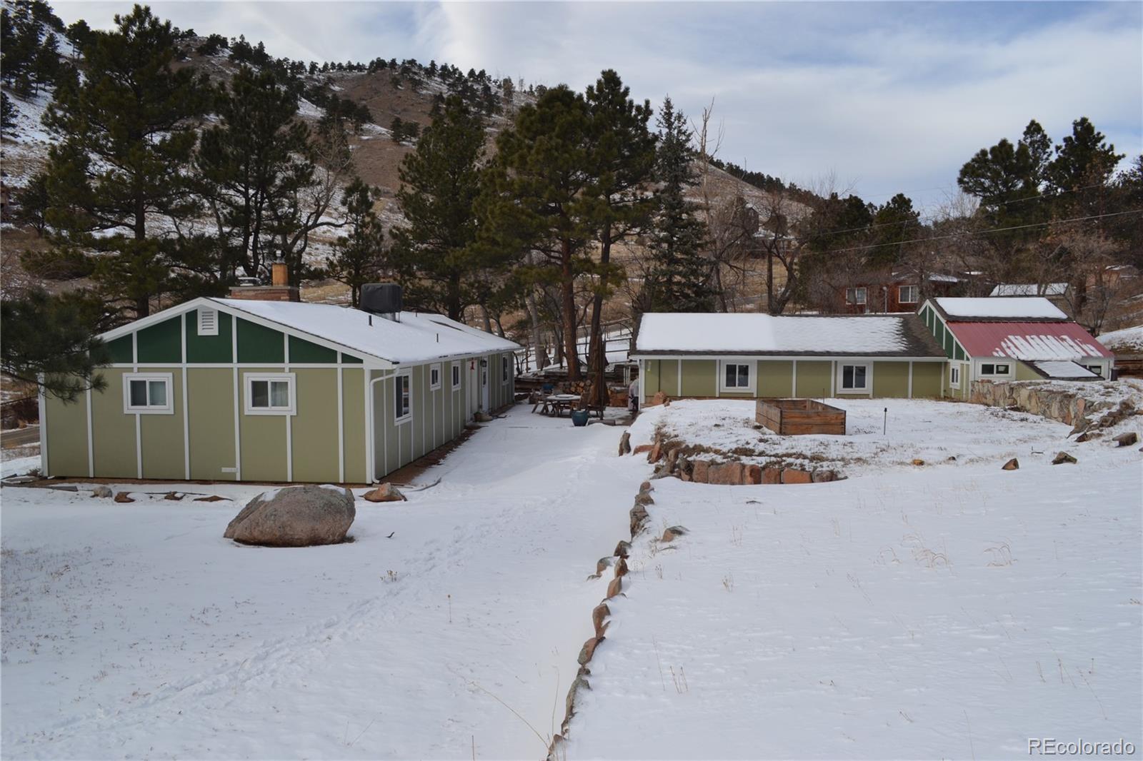 5384 Olde Stage Road Boulder, CO 80302 - Photo 22 of 28 a front view of a house with a yard